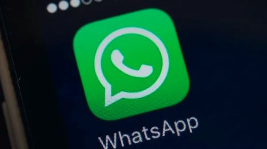 WhatsApp logo on a smartphone screen