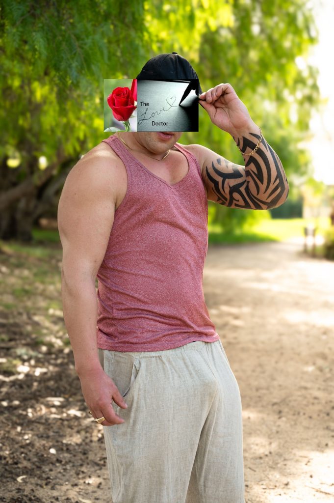 Man in tank top holding card with 