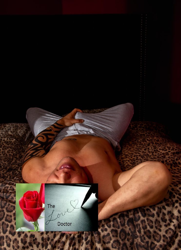 Man on bed with rose and 