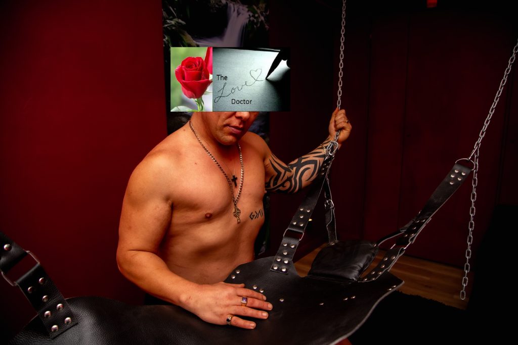 Man in harness swing, with 'The Love Doctor' text overlay